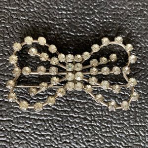 Large vintage rhinestone bow pin